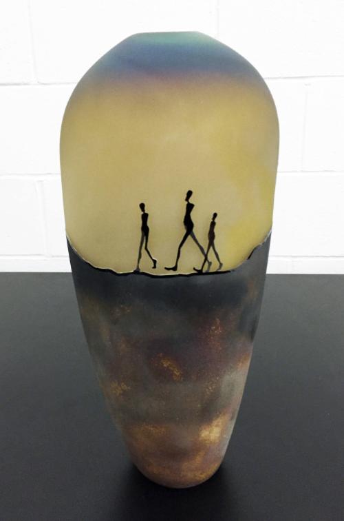 Tall vase with small walking figures