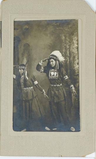 Two Native American female scouts in performance