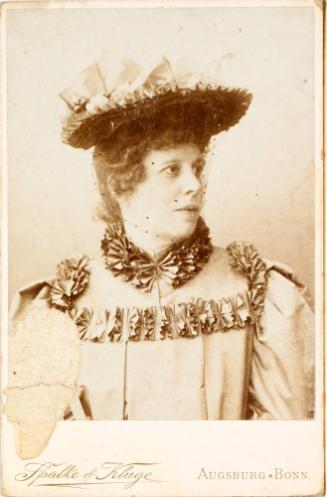 Half length portrait of Lela Cody