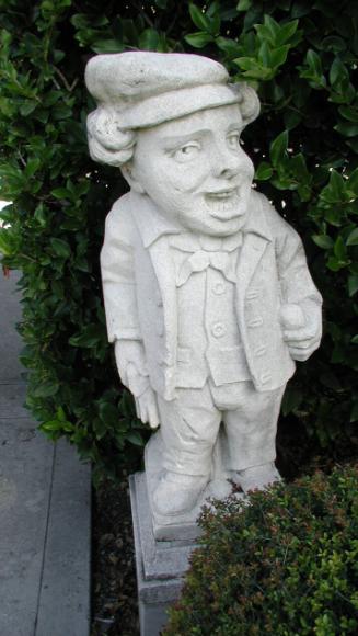 Laughing Dwarf holding gloves