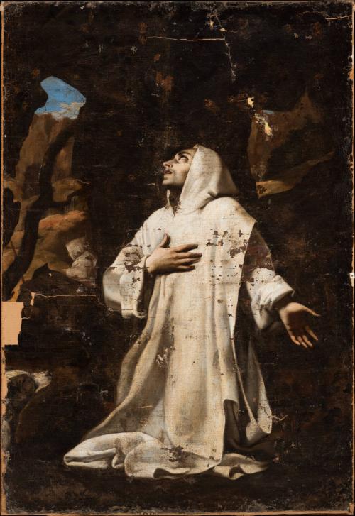 St. Bruno in white robes on his knees looking at the sky through a small window in cave