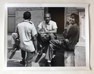 Men on a stoop, Cuba