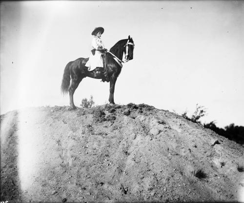 Portrait of Mrs. Zack T. Miller on Horseback