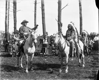 Portrait of Chief Iron Tail and William "Buffalo Bill" Cody on Horseback