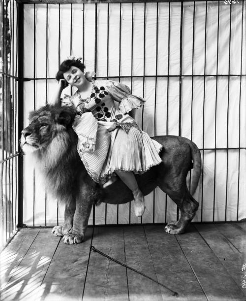 Portrait of Madame Schell atop a lion