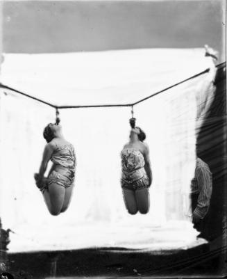 Portrait of Edith and Florence Siegrist Hanging by their Teeth