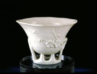 Cup (in magnolia form with molded prunus decoration)