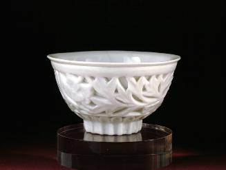 Cup with double walls and openwork sides