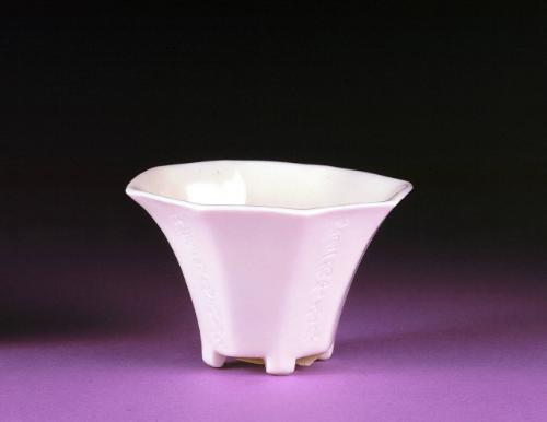 Octagonal wine cup with incised inscriptions on alternate sides