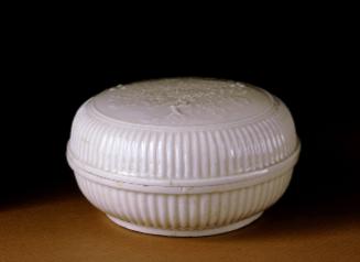 Lidded box molded with peony design