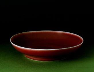 Dish with 'sacrificial red' glaze
