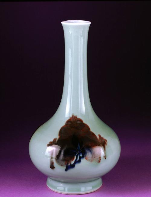 Bottle decorated in red and blue with three fruits (peach, pomegranate and persimmon)