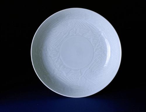 Dish with molded phoenix design