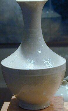 Vase molded with ancient bronze-style design