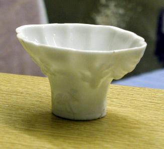 Ornamental cup in rhinoceros horn shape