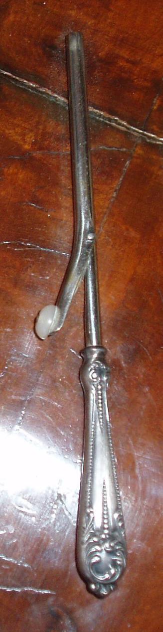 Silver glove stretcher