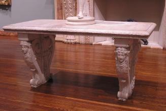 Table with carved legs