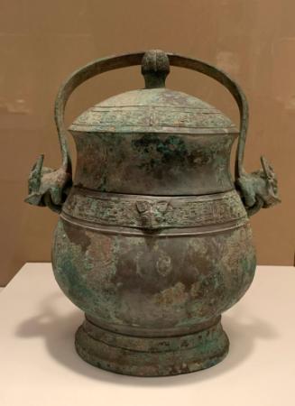 You: Pear -shaped vessel with cover and handle