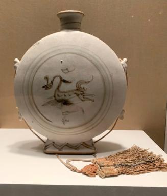 Pilgrim flask with cord and tassel