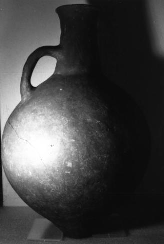 Jug with broad neck and round spout