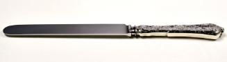 Tiffany salad knife in the Persian pattern.
