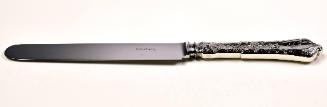 Tiffany salad knife in the Persian pattern.
