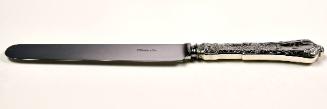 Tiffany salad knife in the Persian pattern.