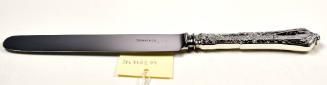 Tiffany salad knife in the Persian pattern.