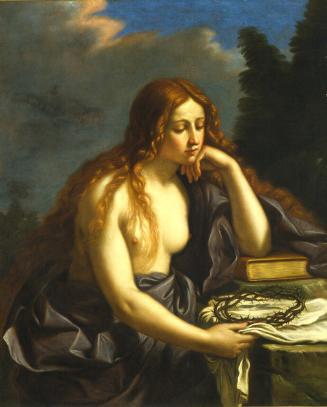 Partially nude woman with red hair looks at crown of thorns