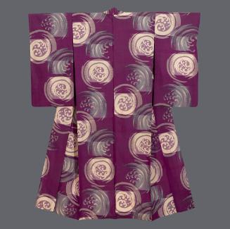 Awase (lined) rayon meisen kimono with wave motifs on purple ground