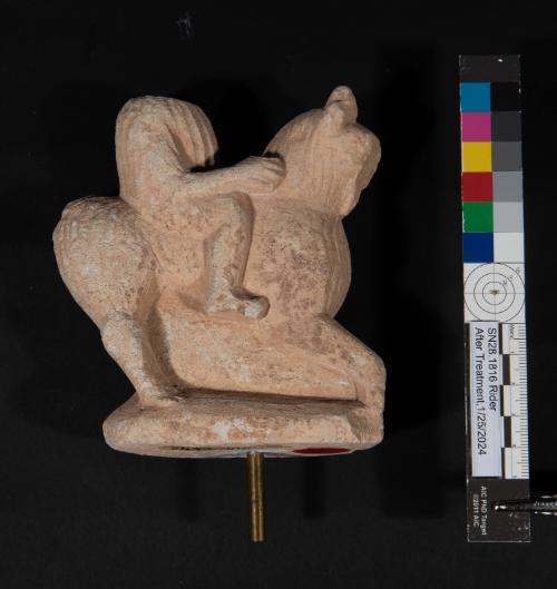 Statuette of a horse with a male rider wearing a short-sleeved tunic