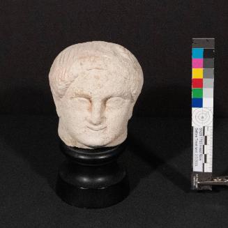 Head of a temple boy statuette