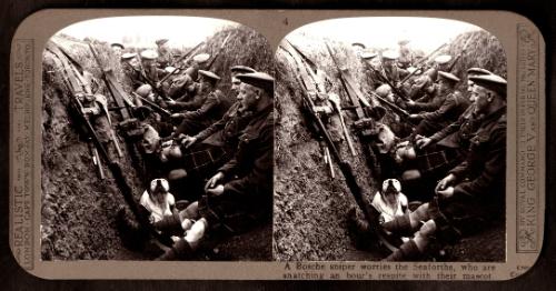 A Bosche sniper worries the Seaforths, who are snatching an hour's respite with their mascot.
