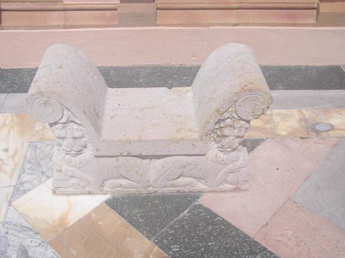 Bench with scrolled armrests