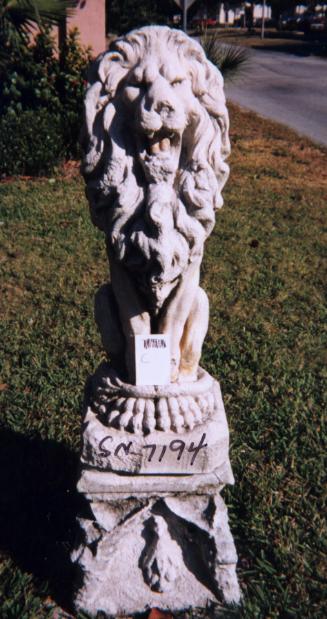 Upright sitting Lion