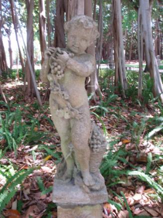 Putto holding garland of grape to right shoulder