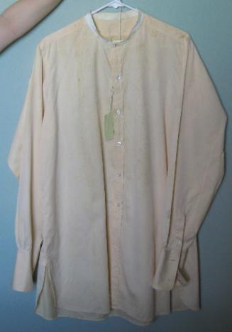 Peach colored shirt