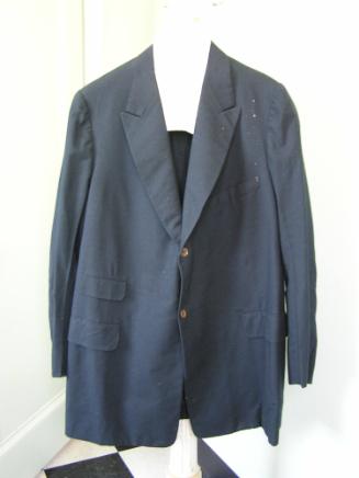 Dark blue-green suit