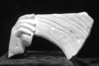 Hand holding drapery