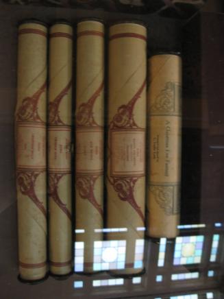 5 scrolls containing music made to be used with a pipe organ