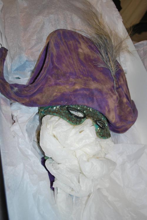 Purple cockade hat and sequined face mask