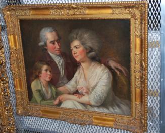Isabelle Marie and Adrien Collumb with their Son