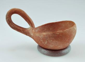 Bowl with vertical handle