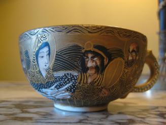 Teacup with Bodhisattva of the South Sea and Arhats