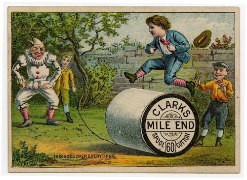 Boy jumping Clark's thread spool