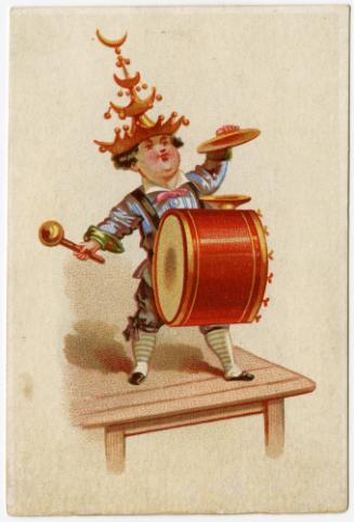 Child playing drum in elaborate hat