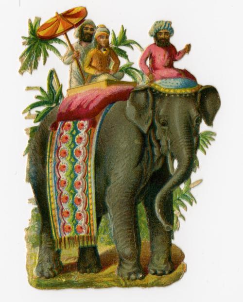 Indian elephant with colorful blanket, three riders