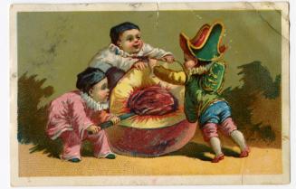 Three children pitting a peach