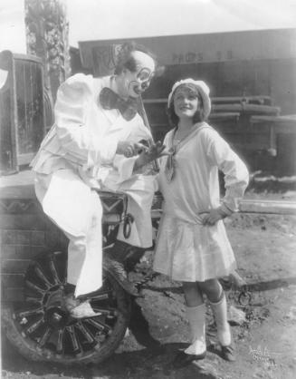 Helen Wallenda poses with a clown.