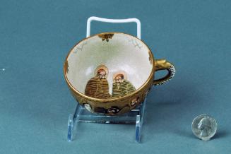Teacup with Bodhisattva of the South Sea and Arhats